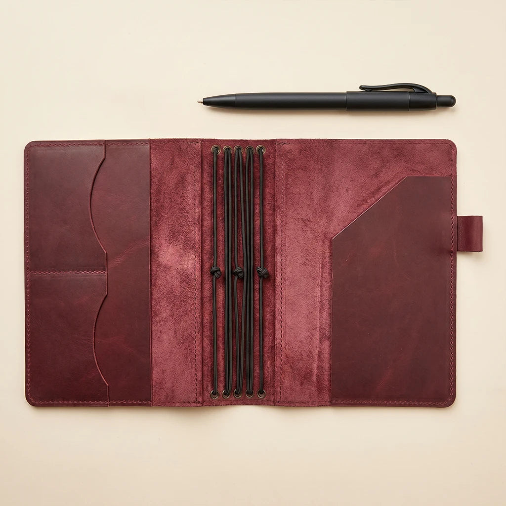 Refillable leather notebook cover designed with five elastics and pen holder