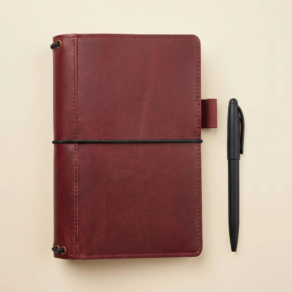 Leather notebook cover with elastic insert holders and practical organizer details