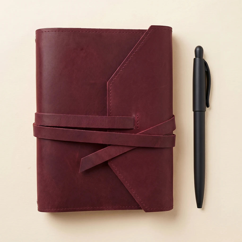 Premium journal cover made from genuine leather with elastic straps and loop.