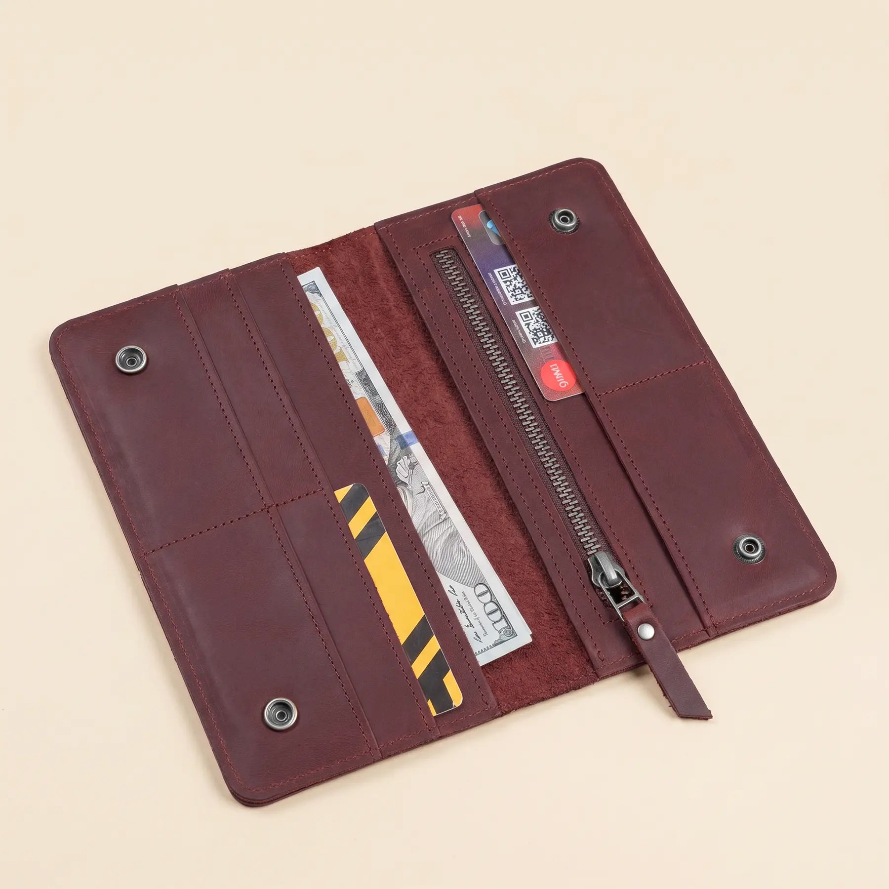 Genuine leather wallet designed with multiple credit card slots and roomy cash compartments inside.