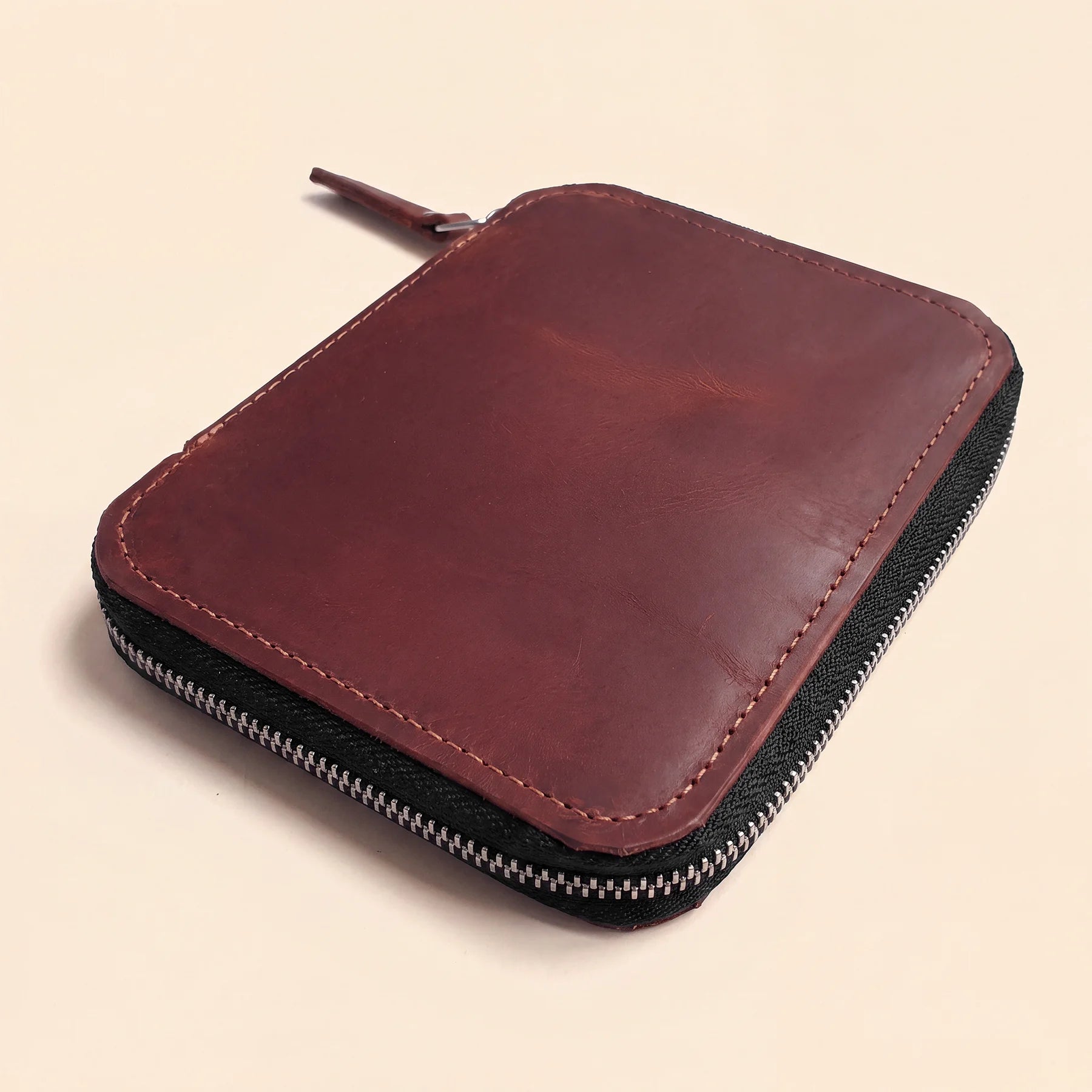 Stylish leather pencil holder case with zipper for everyday office organization.