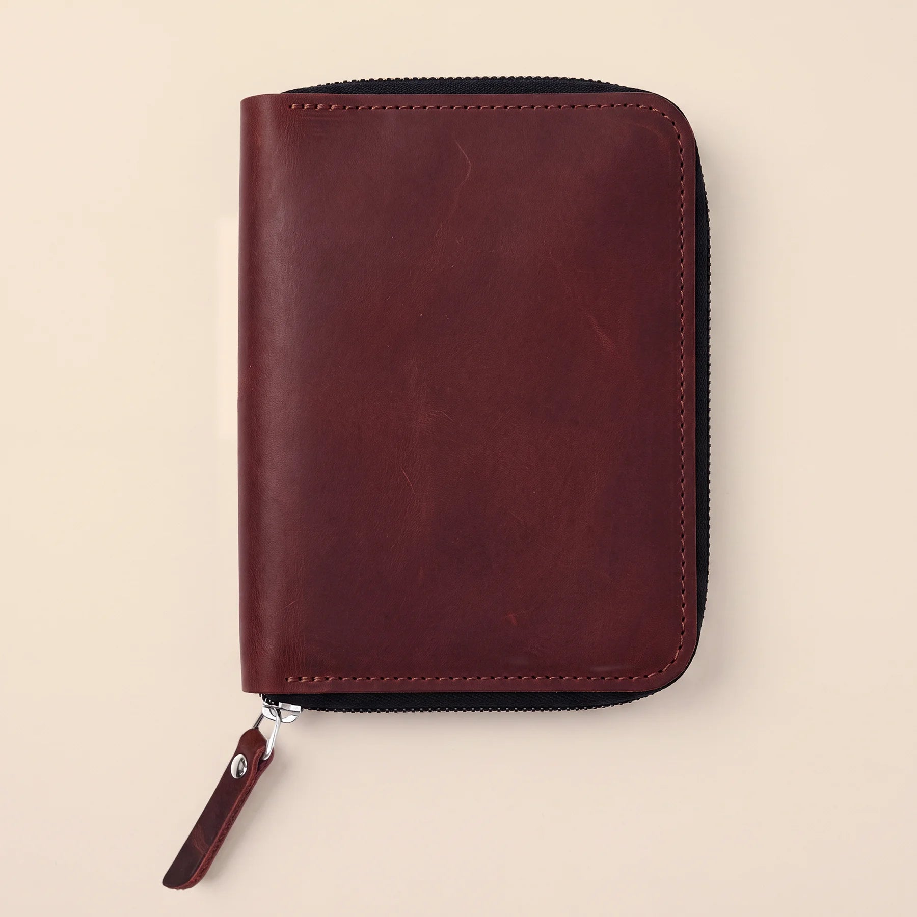 Handmade leather zip organizer ideal for fountain pens, pencils, and markers.