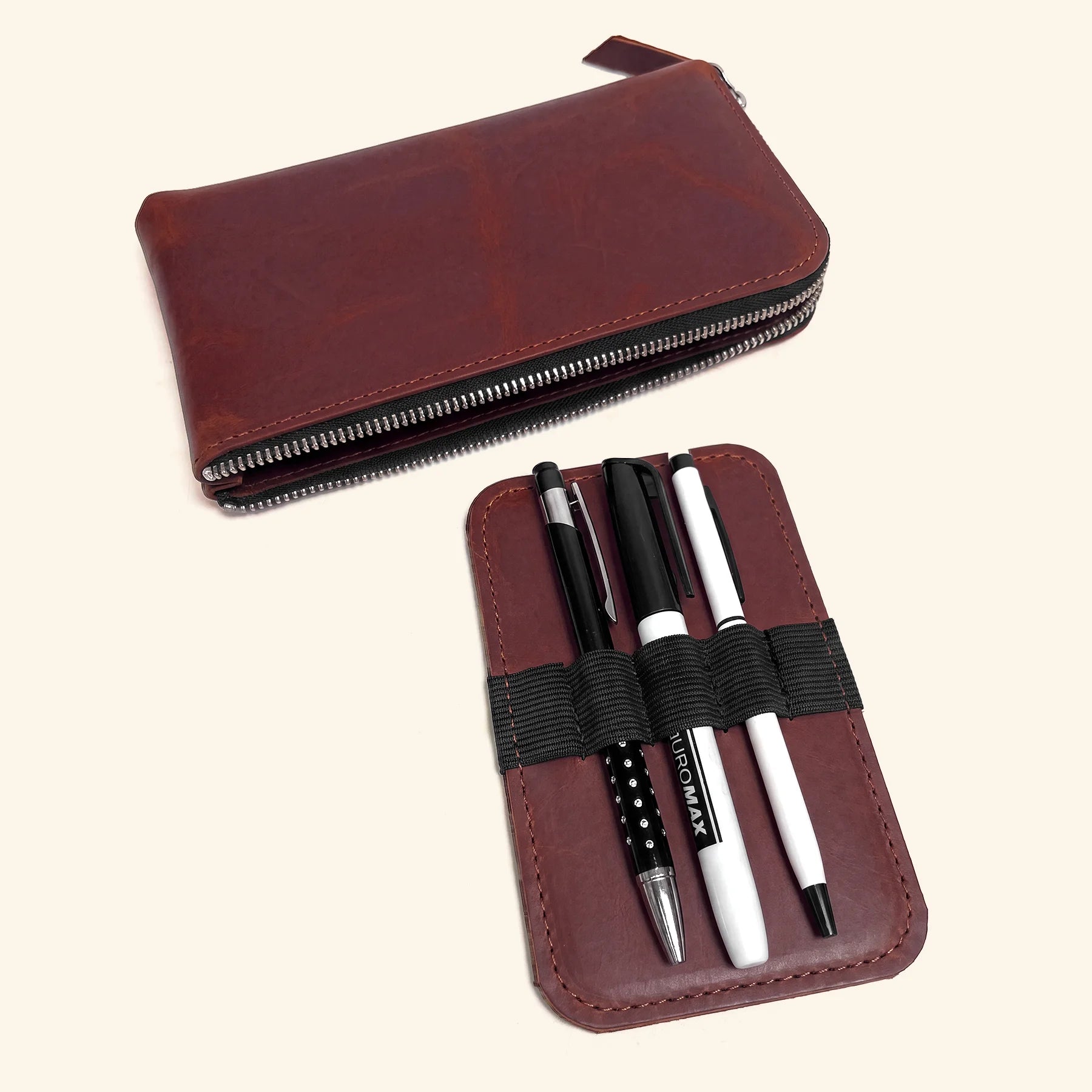 Leather writing supply pouch with zip made for everyday office organization.