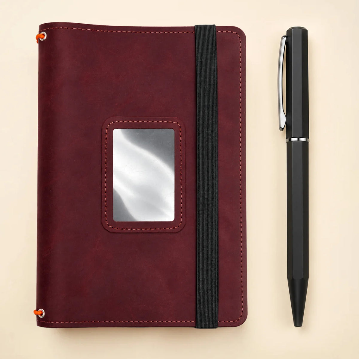 Genuine leather journal cover with useful pockets and three durable elastic bands inside.