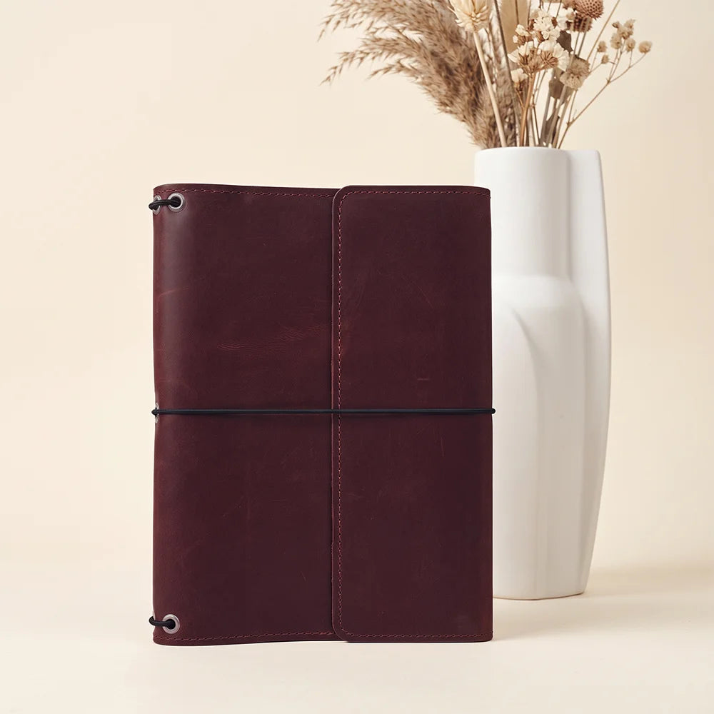 Durable leather travel journal cover made for professionals, students, and frequent travelers alike.