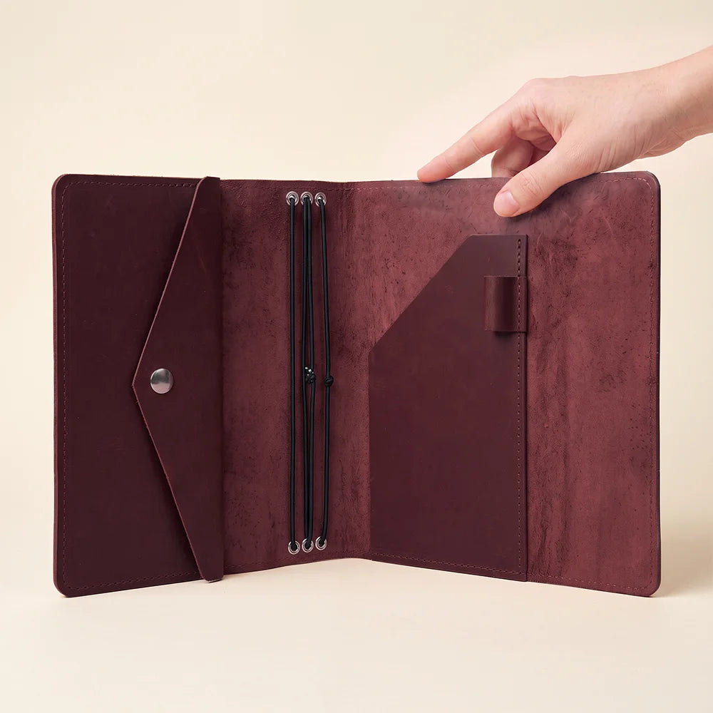 Refillable leather notebook cover built for journaling, sketching, planning, and creative daily writing.