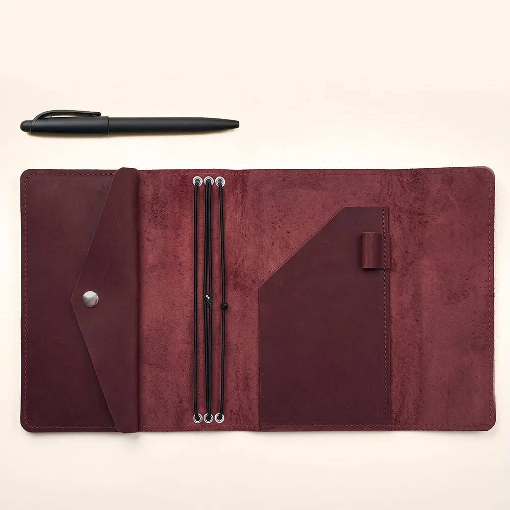Full grain leather notebook cover offering organized storage and dependable refillable notebook functionality.