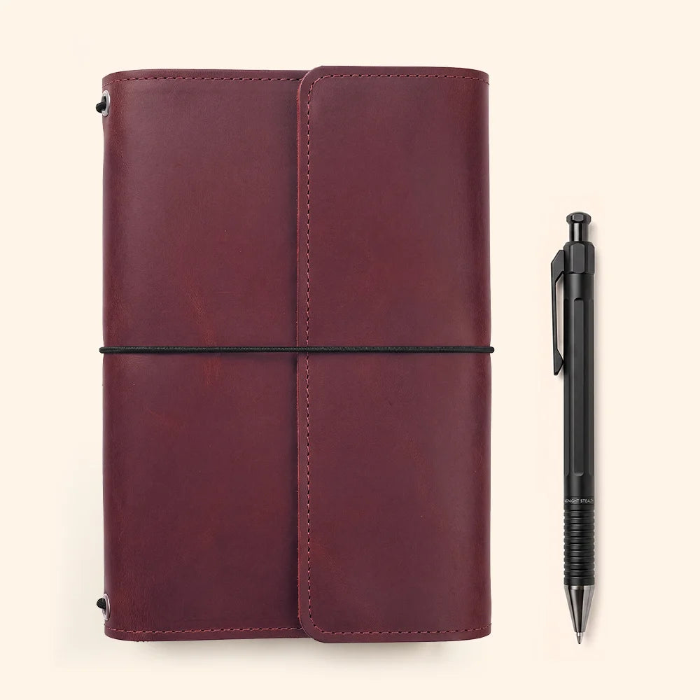 Crafted leather notebook sleeve with useful pockets and integrated storage for everyday pens.