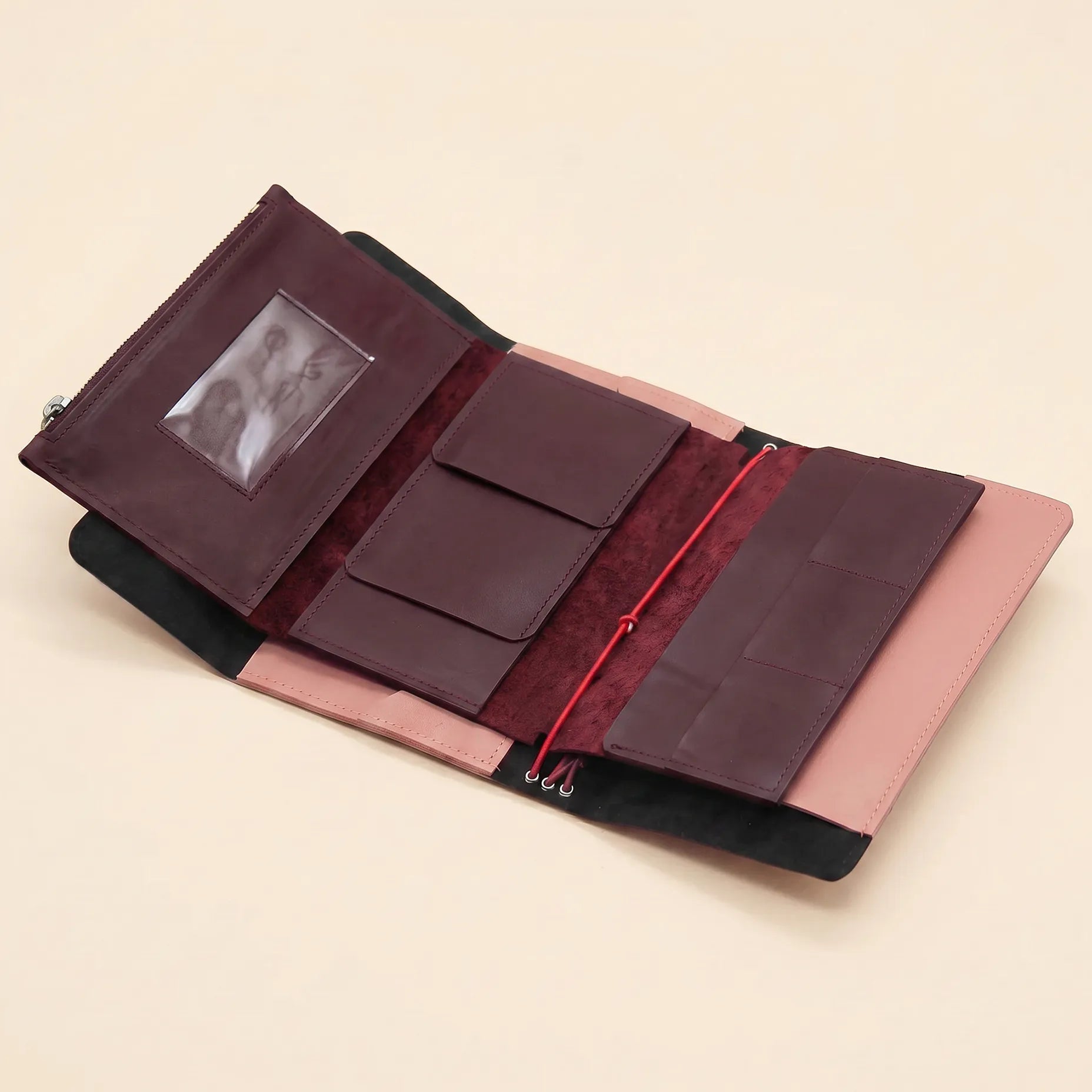Handmade leather notebook accessory with convenient storage pockets