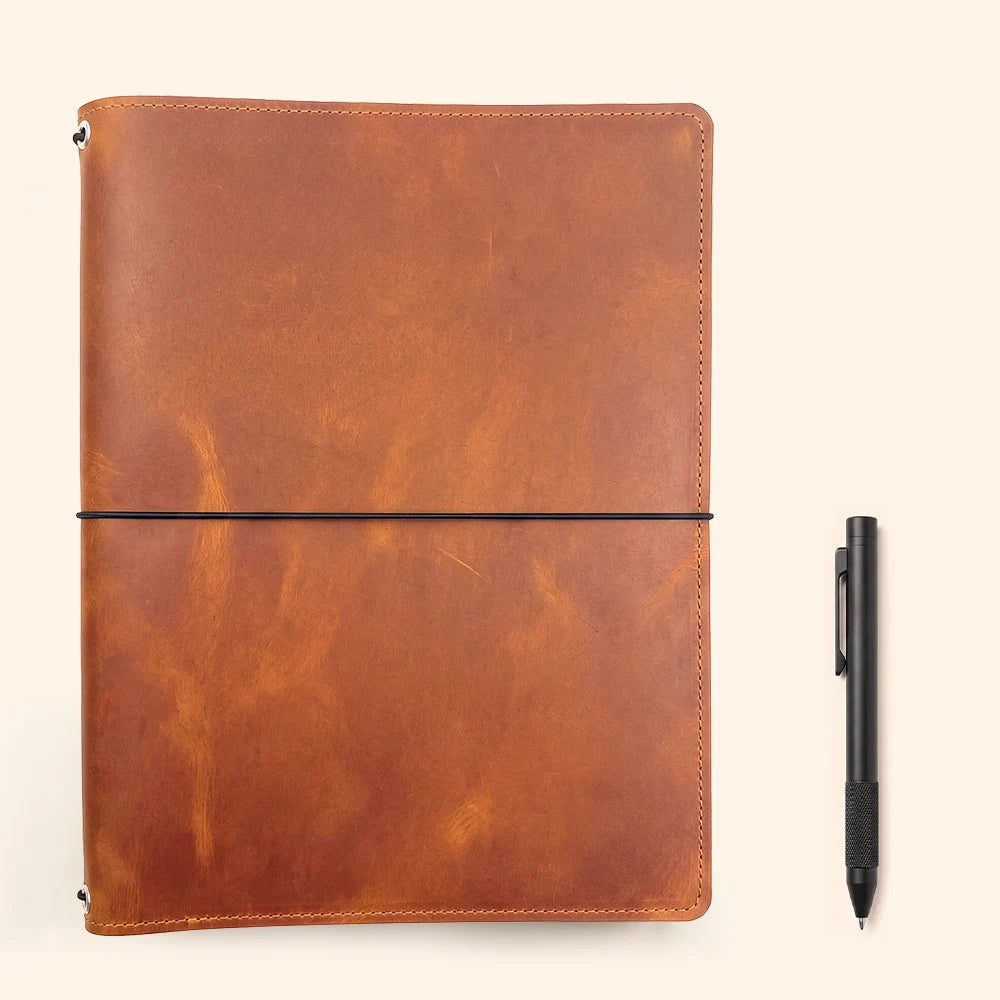 Natural leather notebook cover with a versatile interior for creative and professional use.