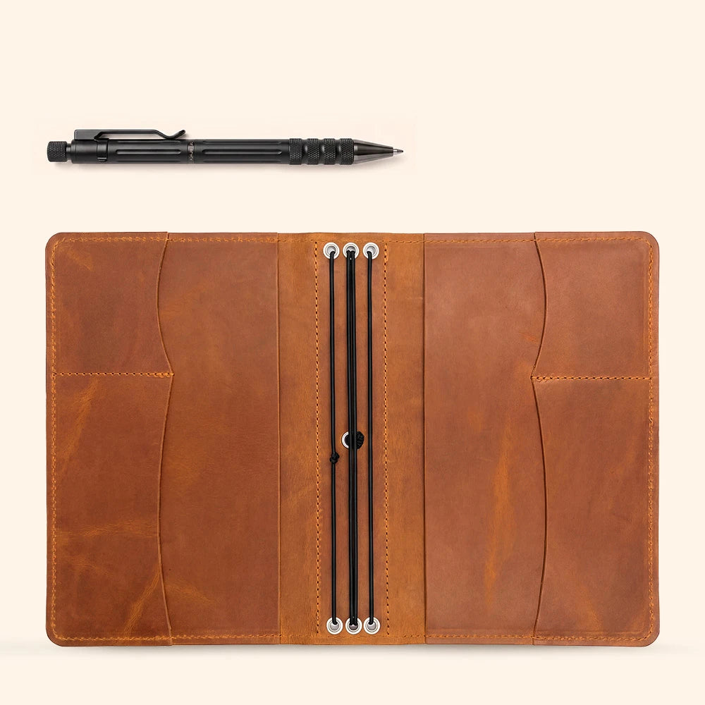 Genuine leather notebook cover offering organized interior pockets and practical pen holder.