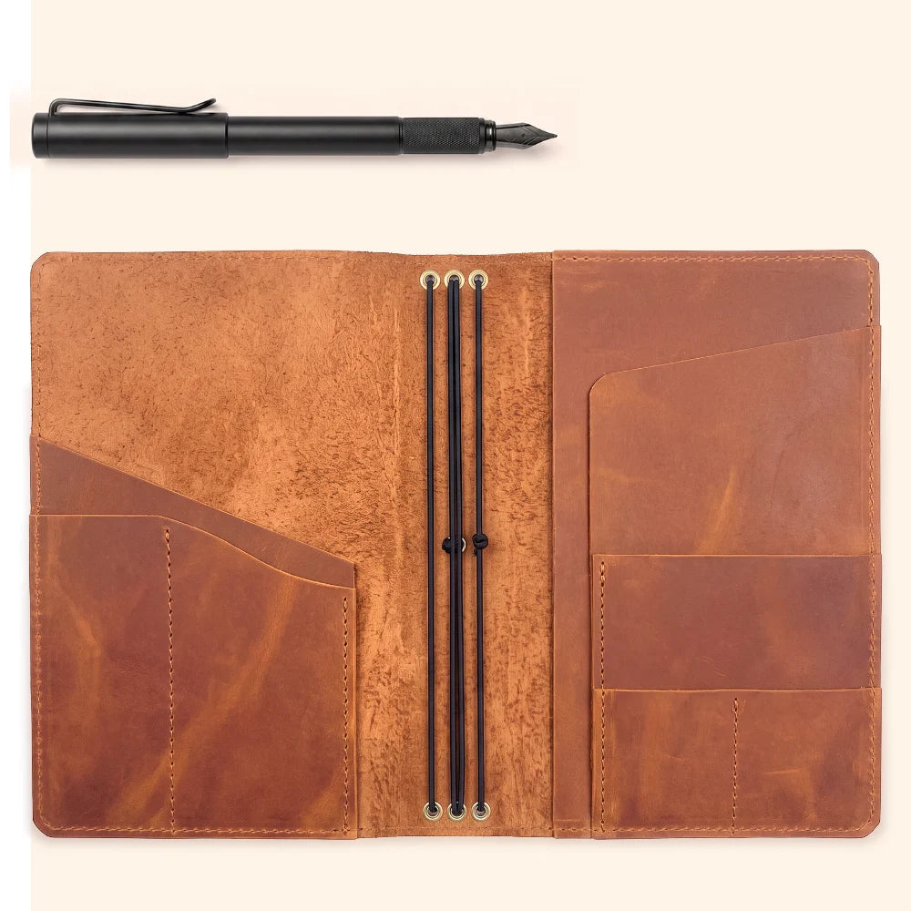 Premium leather notebook cover designed to organize three interchangeable journal inserts.