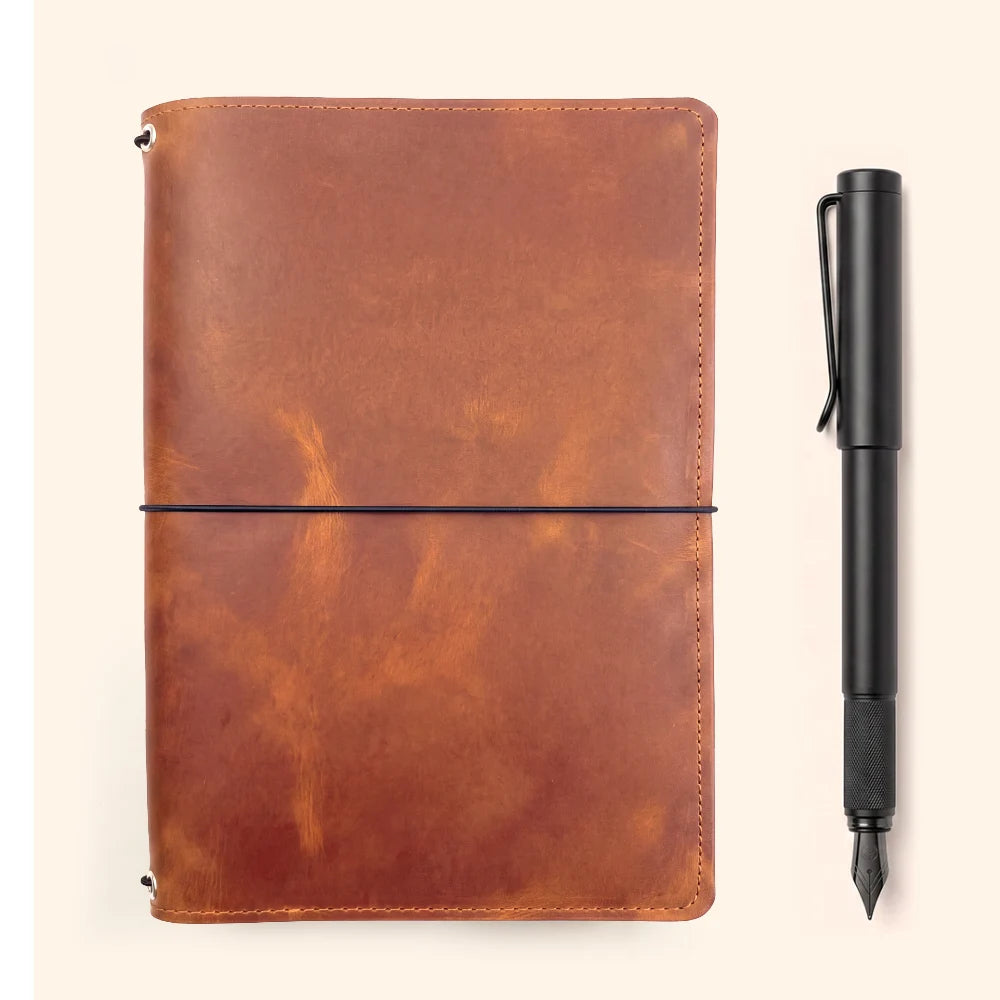 Genuine leather cover featuring three flexible elastics for multiple notebook refills.
