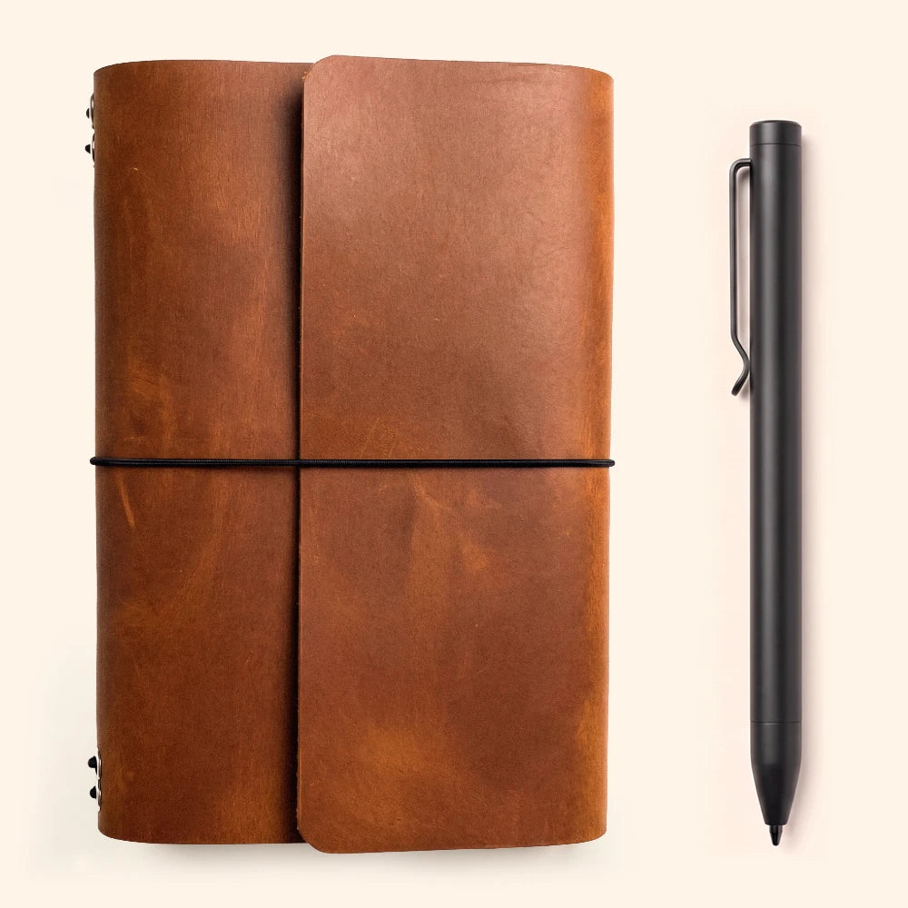 Classic leather refillable planner cover featuring six bands for notebook inserts.