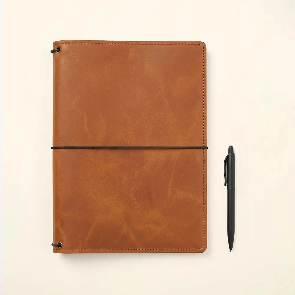 Leather notebook protector with built-in storage compartments and notebook elastic retention.