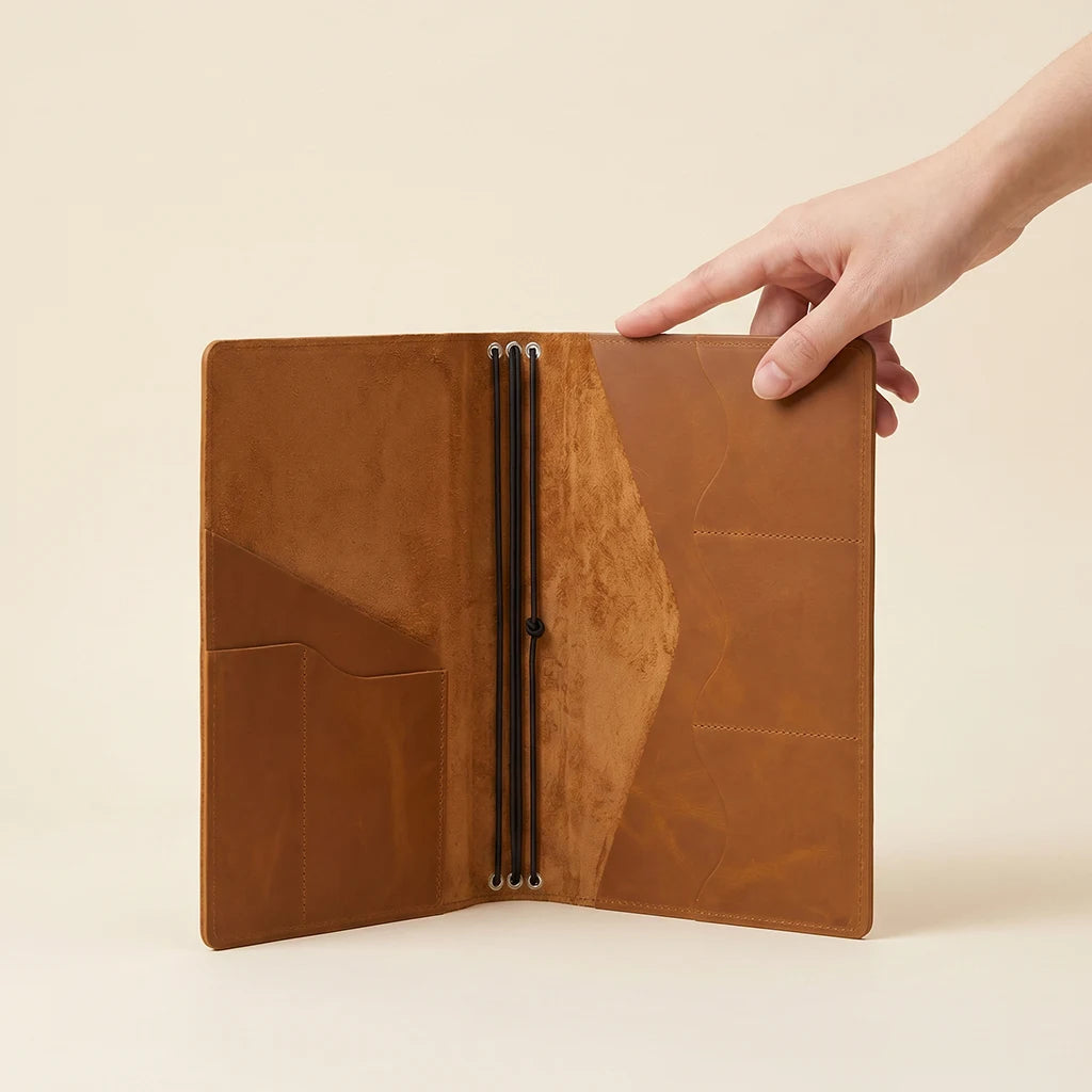 Refillable travel journal cover offering convenient organization and notebook storage.