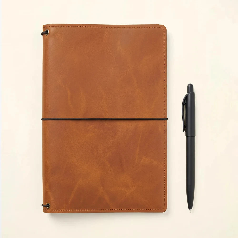Genuine leather notebook folio with three elastic notebook holders and storage compartments.