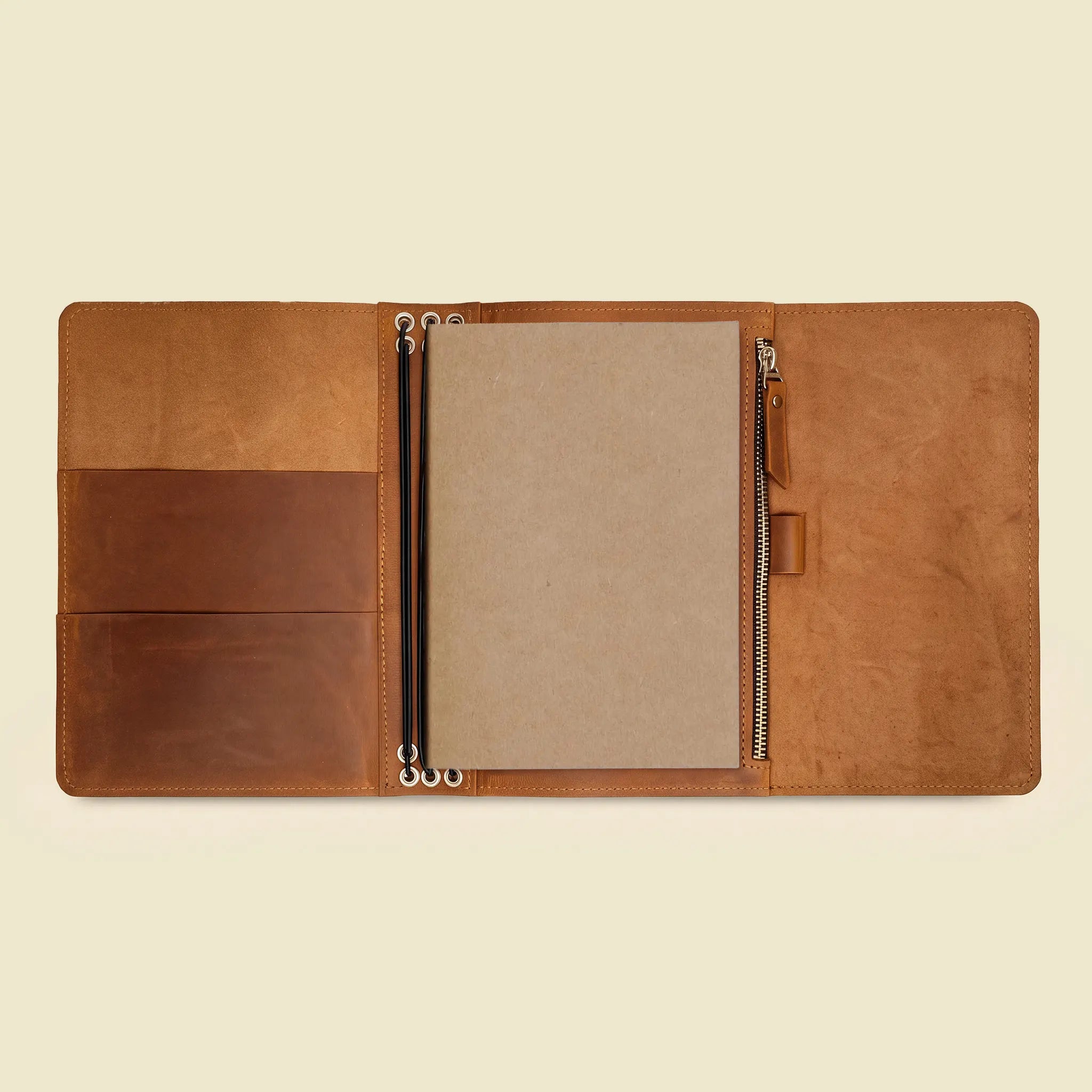 Open leather notebook case featuring a practical interior for creative daily routines.