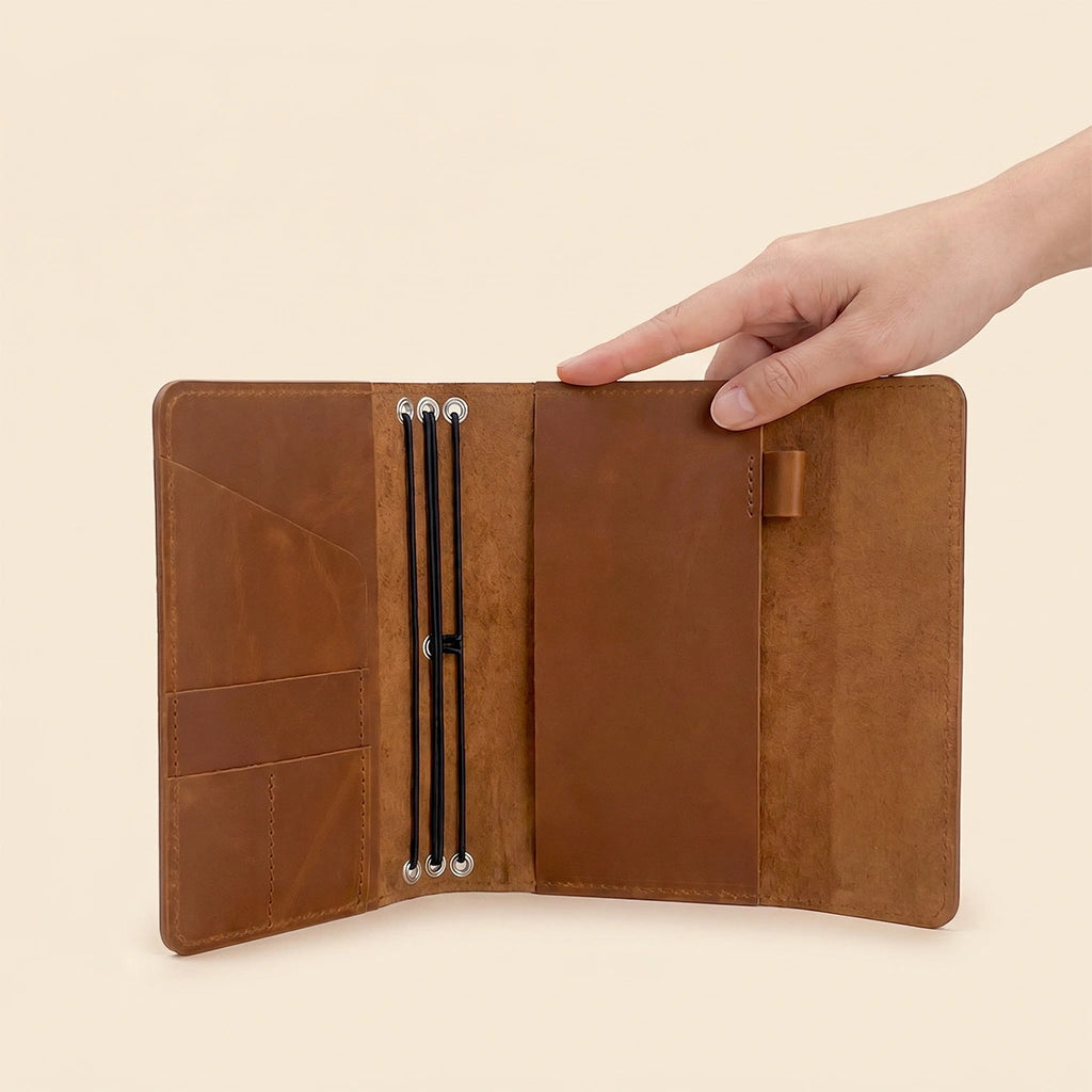 Handcrafted journal cover made from natural leather with practical everyday storage features.