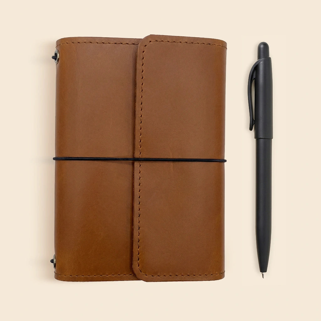 Genuine leather notebook organizer designed for journals, cards, and everyday essentials.
