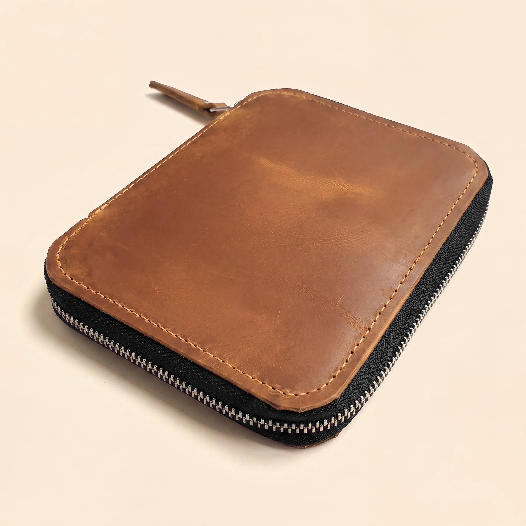 Genuine leather zip pencil case combining timeless style with practical organization.