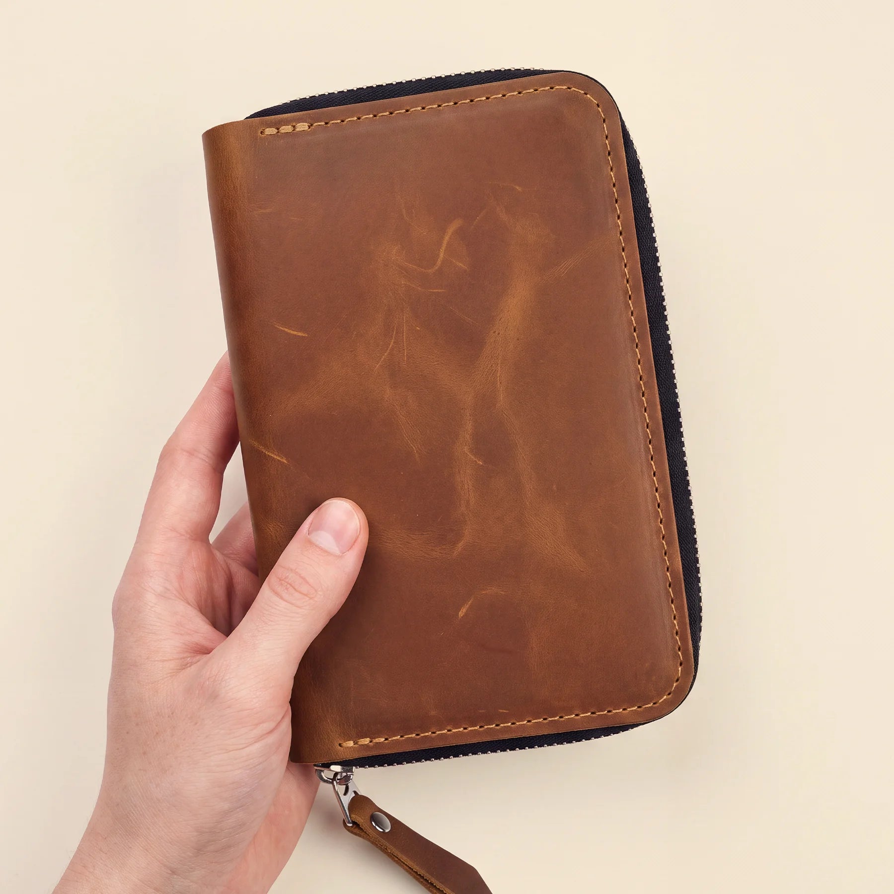 Handmade leather writing case with zipper and soft premium natural leather finish.