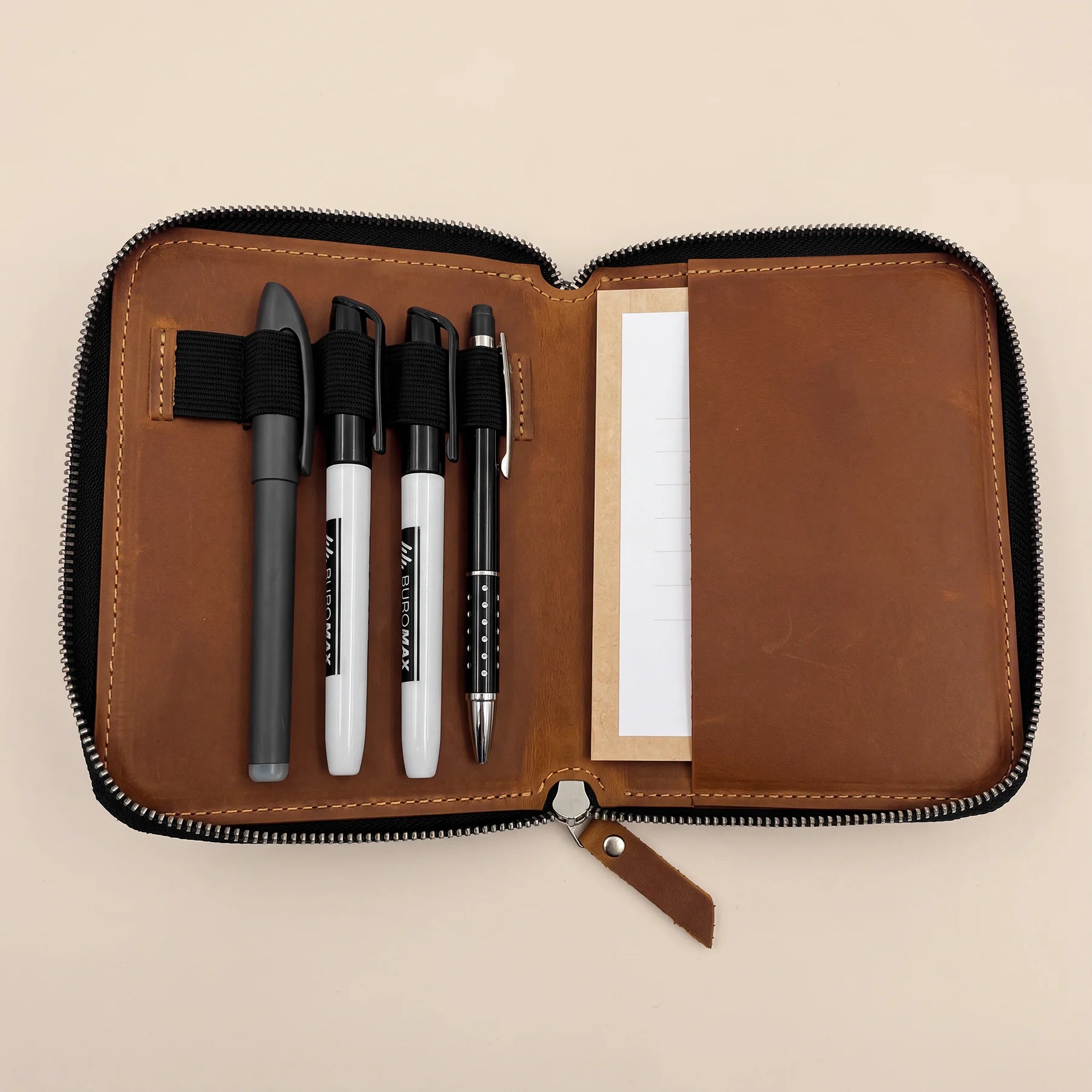 Artisan leather writing pouch featuring smooth zipper and durable handcrafted construction.