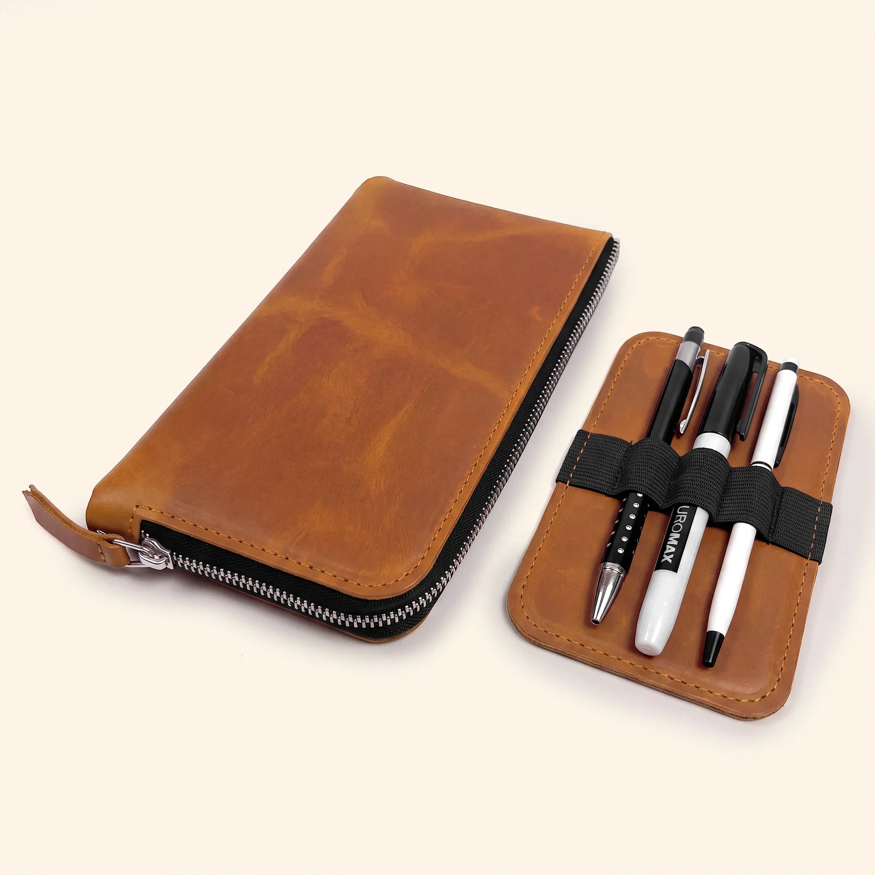 Durable leather pen organizer wallet with zipper for work, school, and travel.