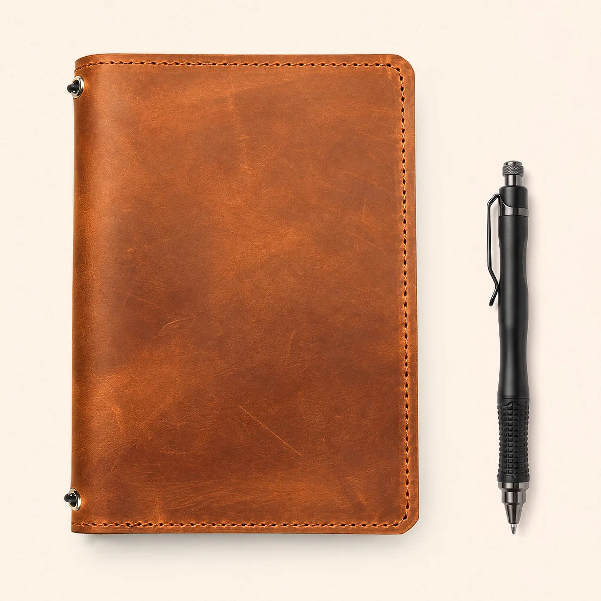 Rustic natural leather journal cover with dual elastic holders and carefully crafted pockets