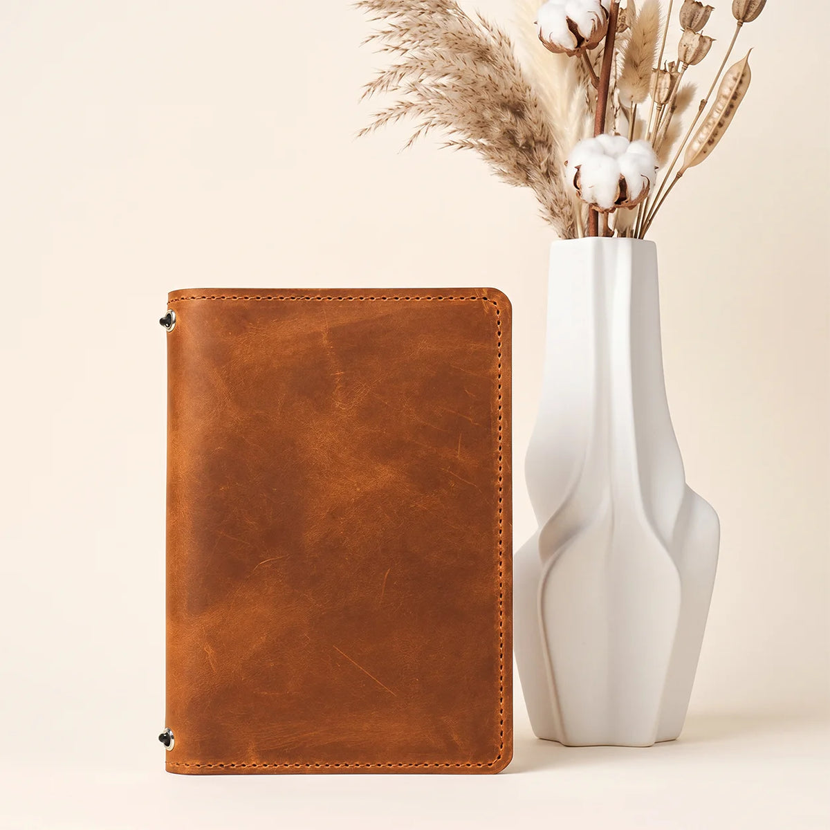 First grade genuine leather journal cover with two flexible retainers and practical storage