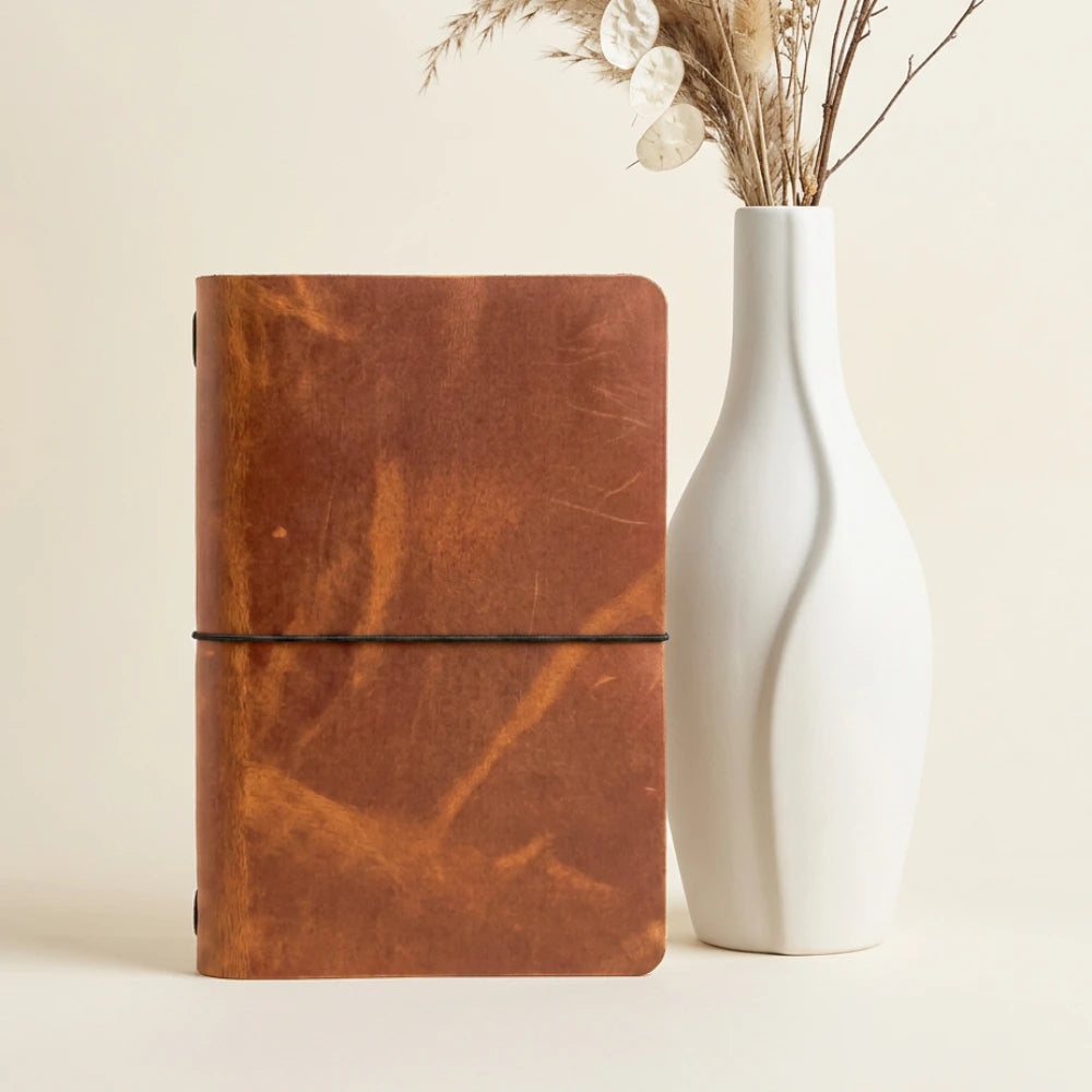 Genuine leather notebook cover combining timeless craftsmanship with practical minimalist design.
