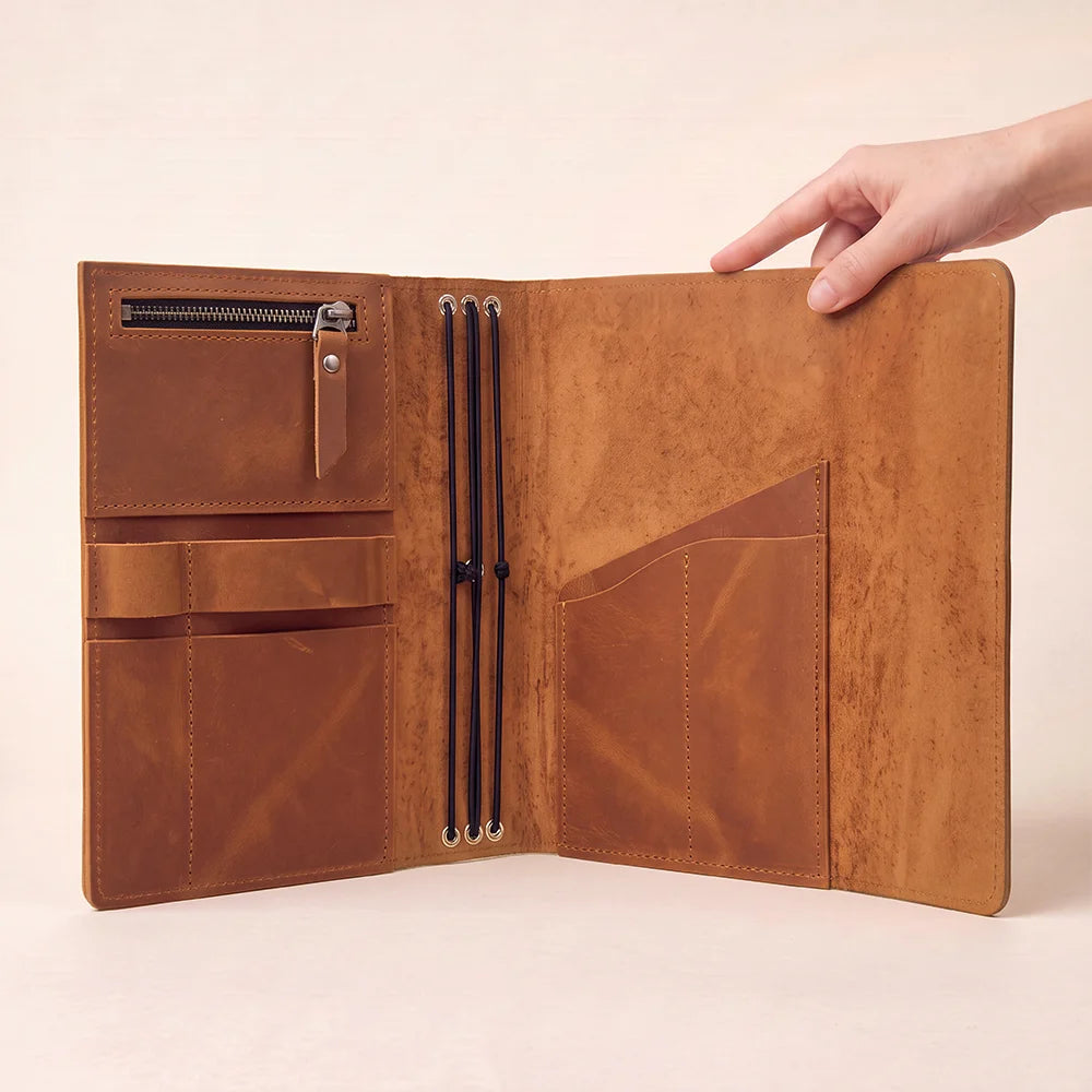 Natural hide notebook cover with carefully designed storage areas and convenient pen accommodation