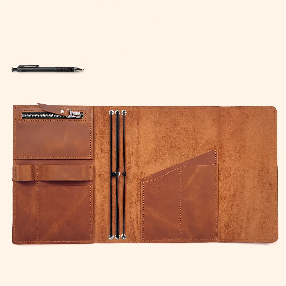 Handmade leather journal organizer showcasing multiple compartments and a dedicated place for pens