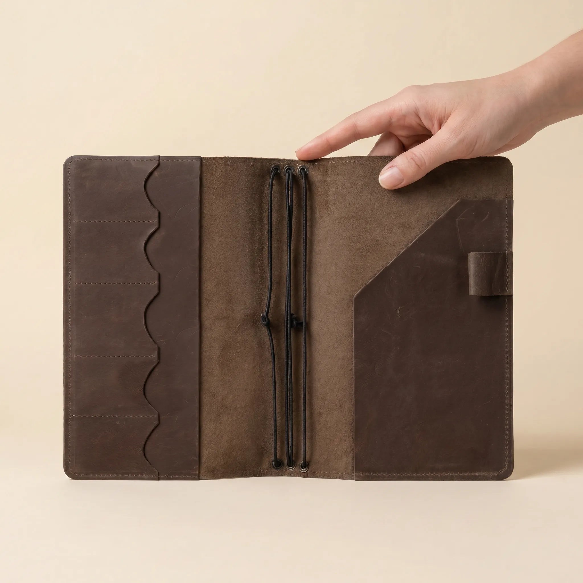 Handcrafted notebook protector made from genuine leather with elegant finish.