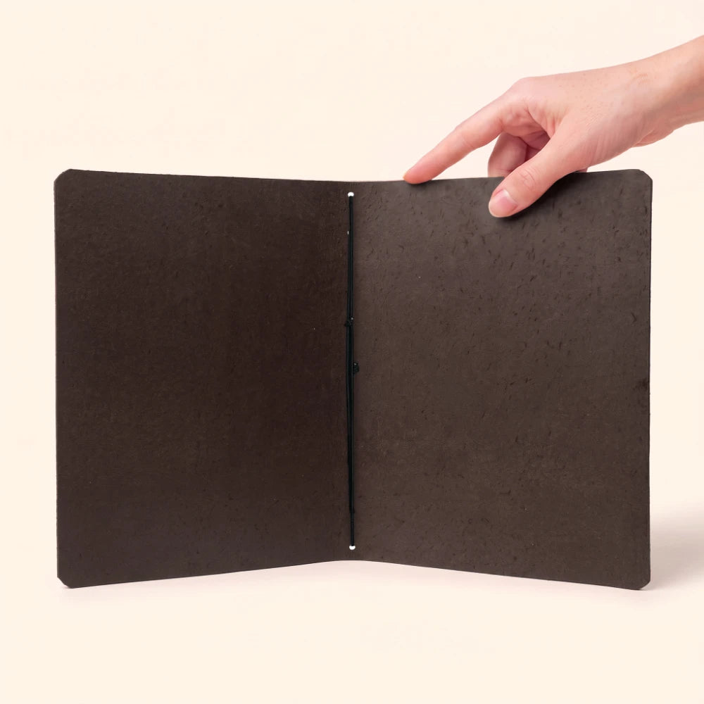 Handcrafted leather cover offering a refined home for a simple everyday journal.