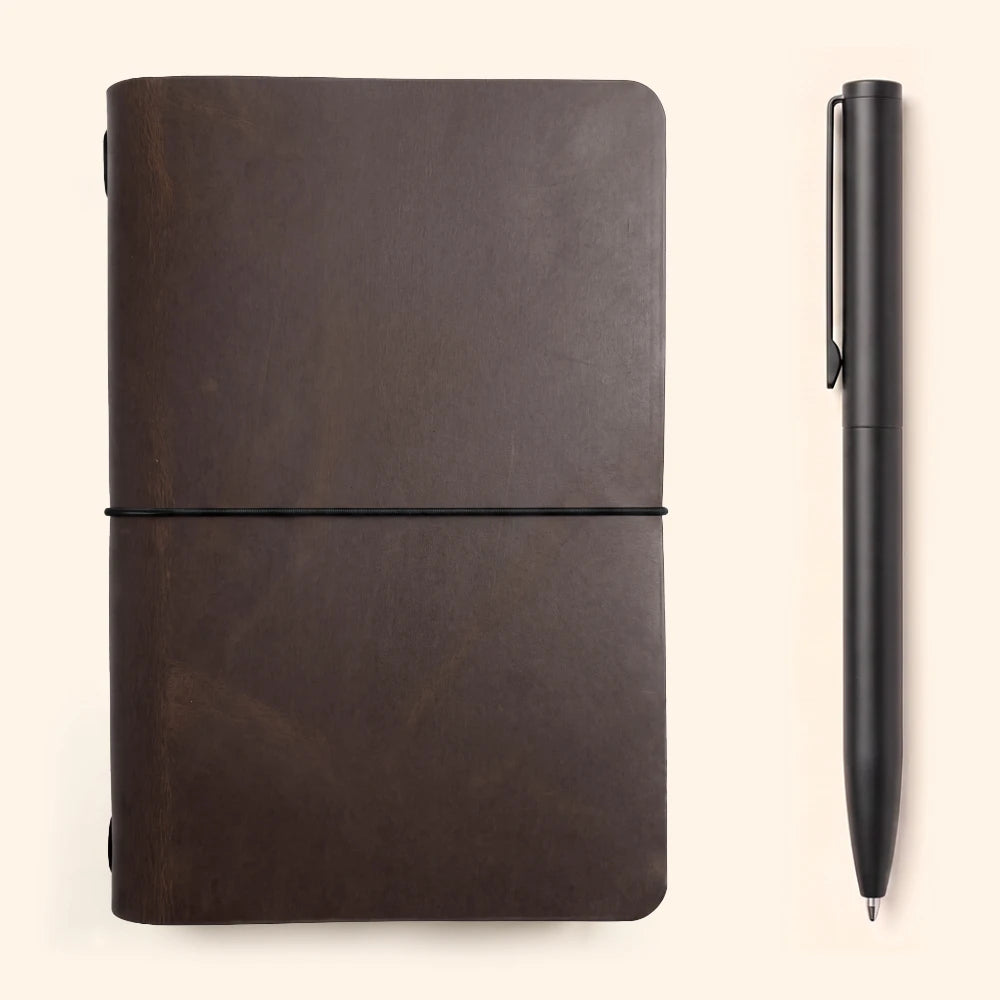 Handmade genuine leather journal cover featuring smooth texture and one interior elastic.