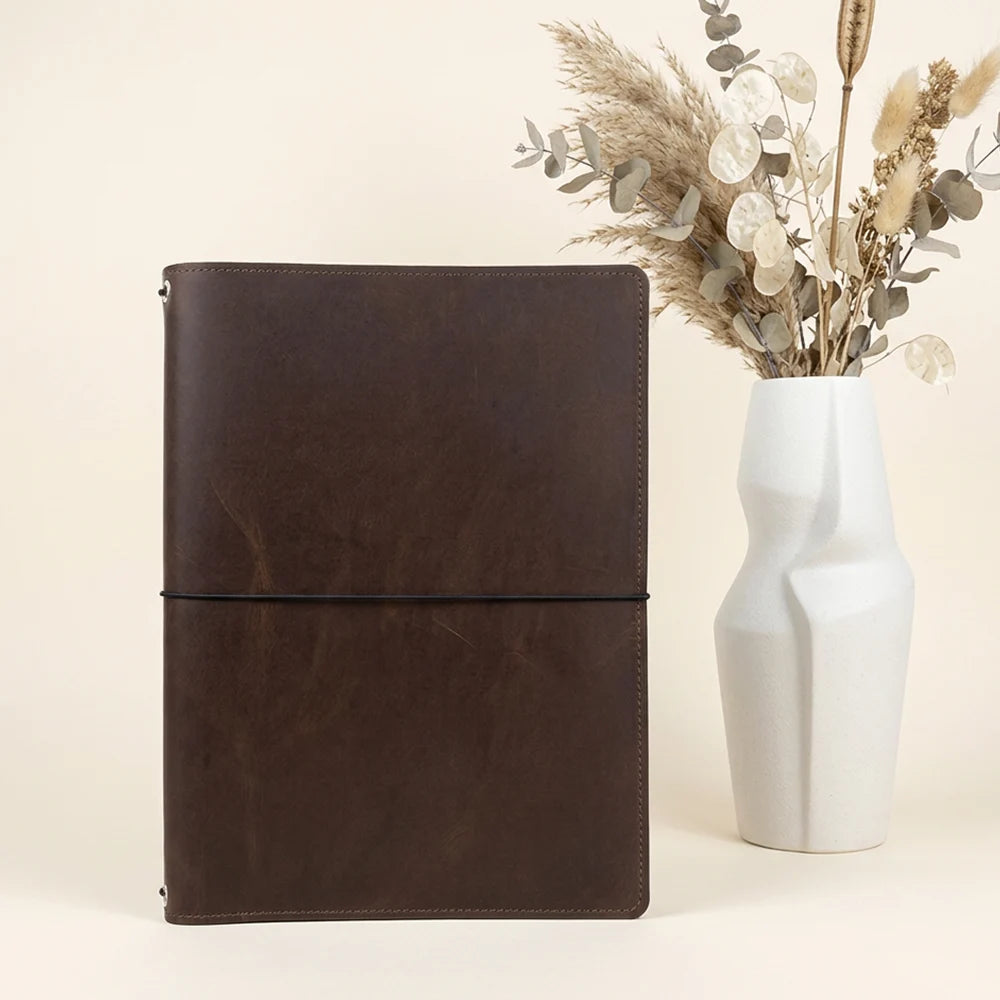 Handmade genuine leather cover with elastic straps, card pockets, and sketchbook holder.
