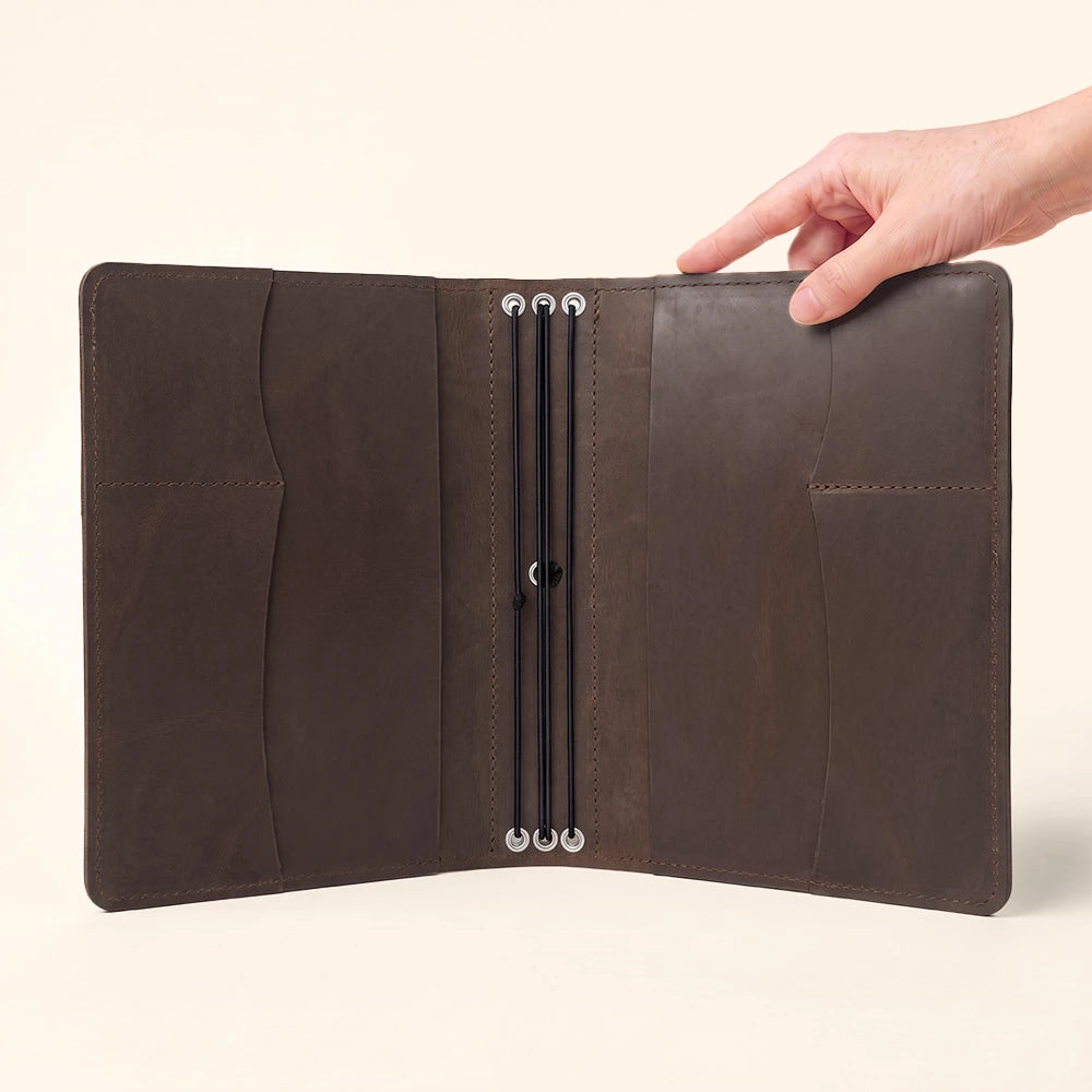Leather notebook holder featuring practical organization for journals, notes, and accessories.