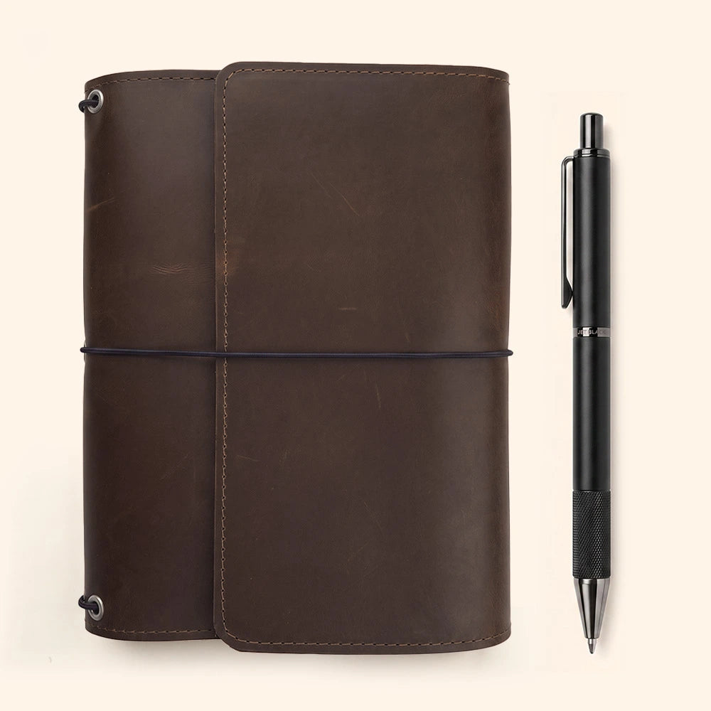 Rustic leather notebook folio with interior organizer and secure leather pen attachment.