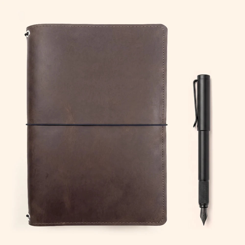 Reusable leather journal organizer with three stretch cords for easy customization.