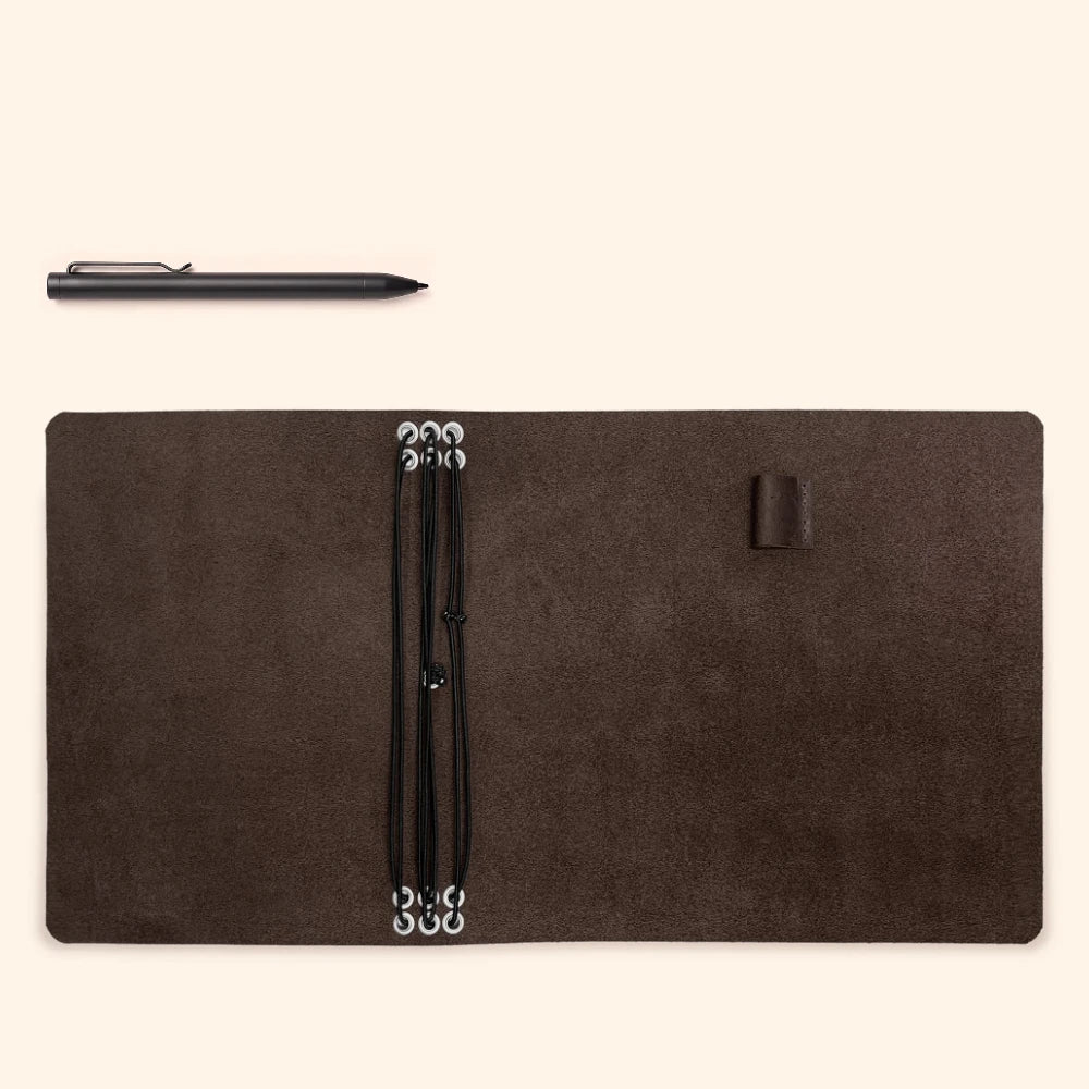 Durable leather notebook portfolio designed for six refills and easy pen access.