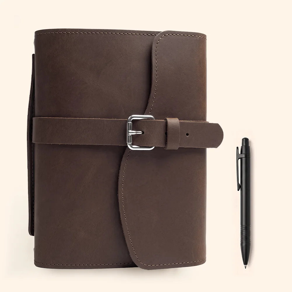 Genuine hide notebook cover with practical storage compartments, pen loop, bookmark ribbon, and portable grip.