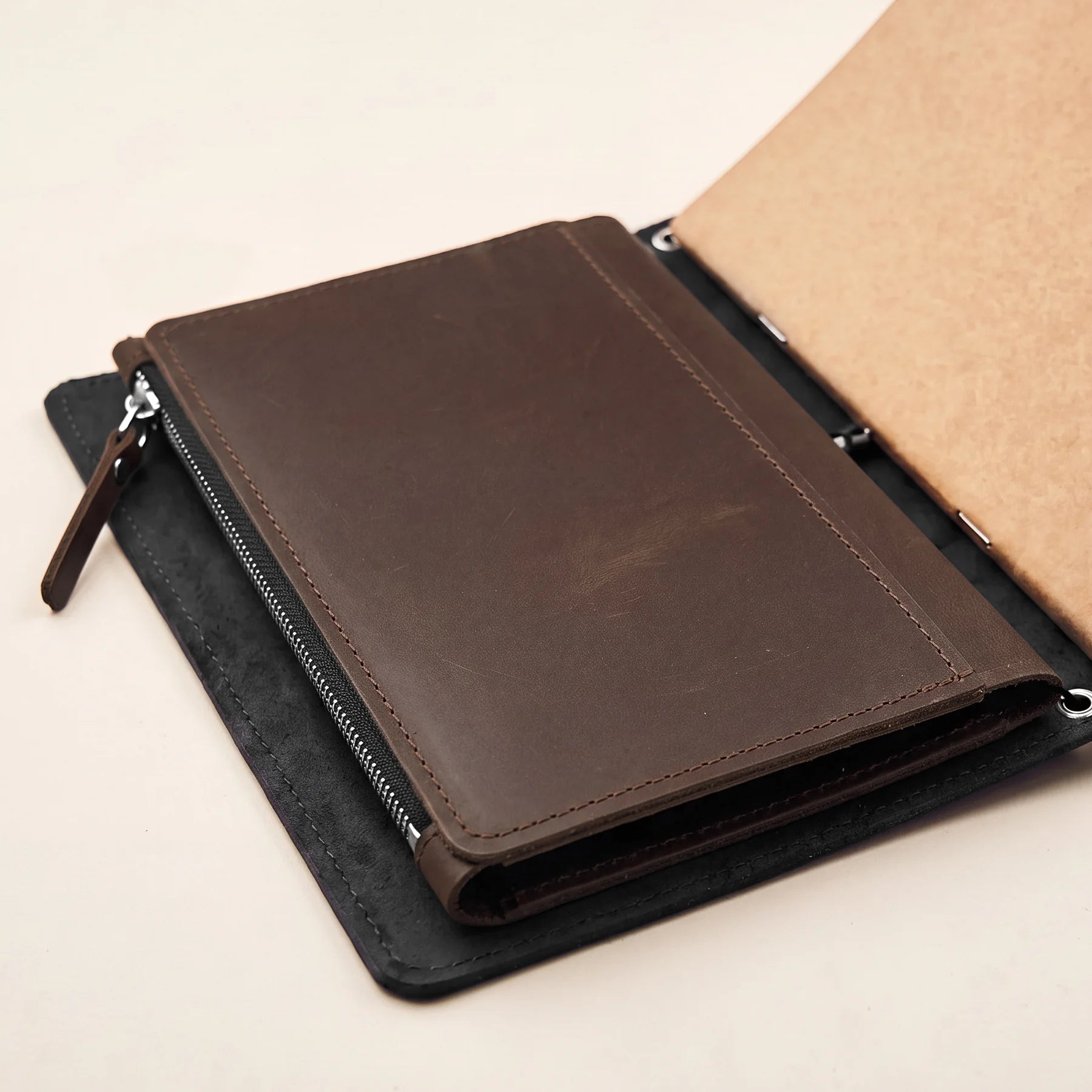 Genuine leather notebook pocket insert compatible with elastic travel journal covers.