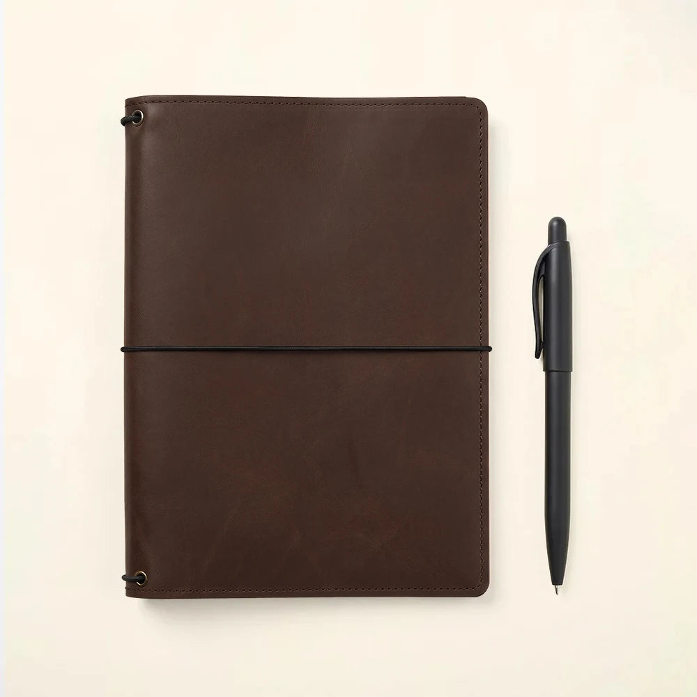Handmade leather notebook portfolio with card organizers and secure elastic notebook loops.