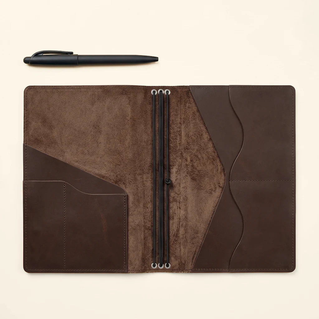 Premium leather notebook case displaying practical organization for everyday carry.
