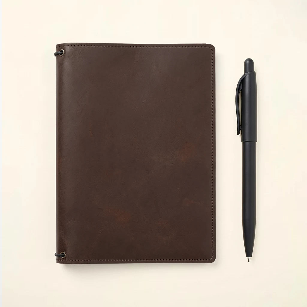 Leather journal wrap featuring multiple compartments for cards and notes.