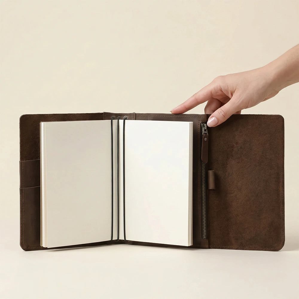 Genuine leather notebook cover with practical storage and elastic system.
