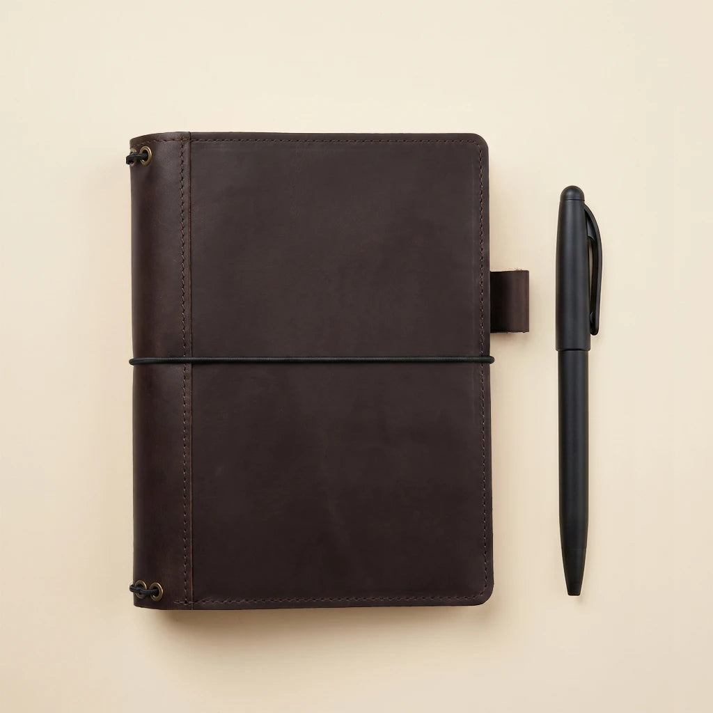 Functional leather notebook organizer with refillable design and pen loop