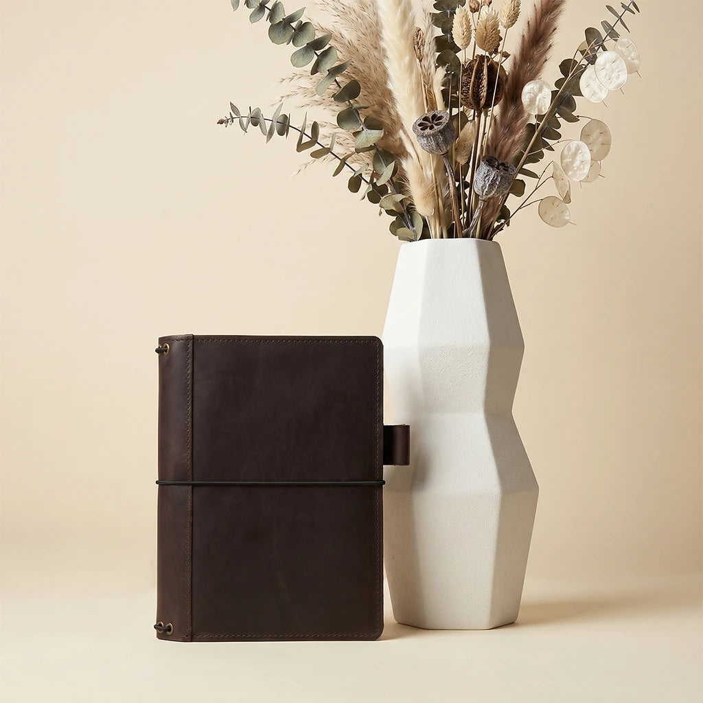 Handmade journal cover crafted from leather with interior pocket details