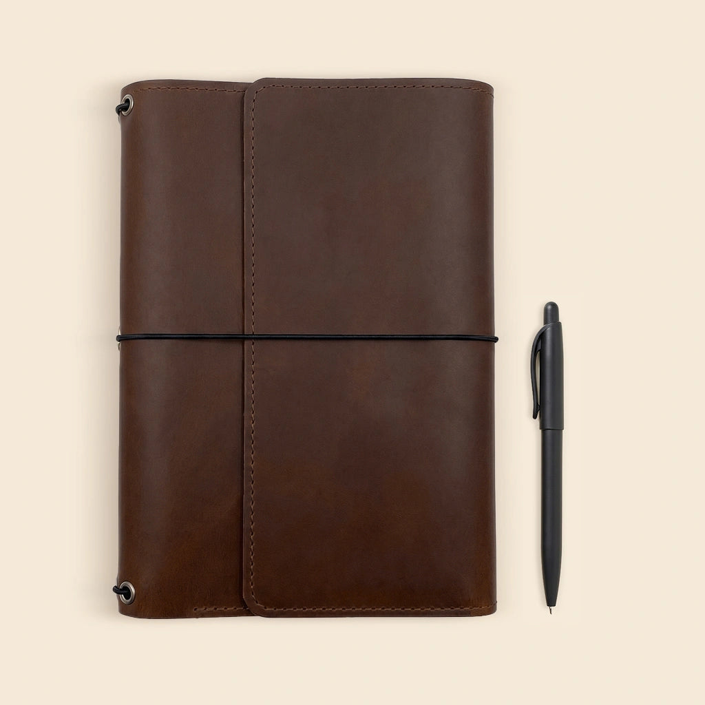 Refillable leather notebook wallet combining elegant design with practical everyday organization.